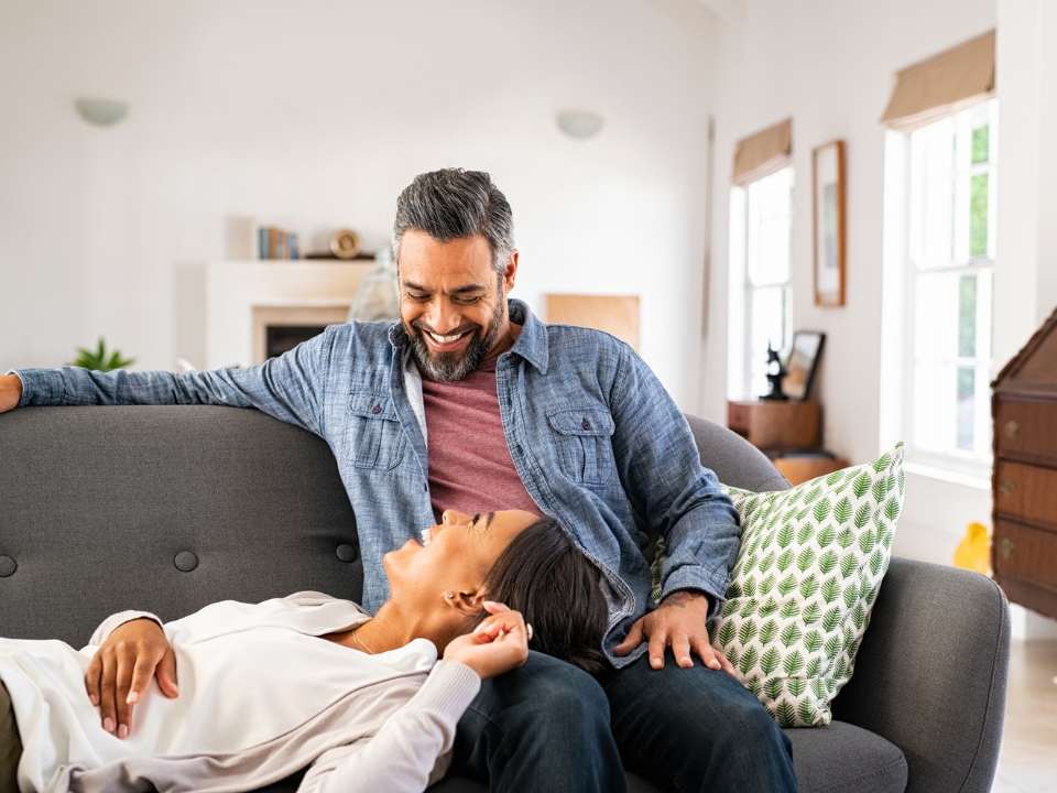 Relaxed couple enjoying time together at home